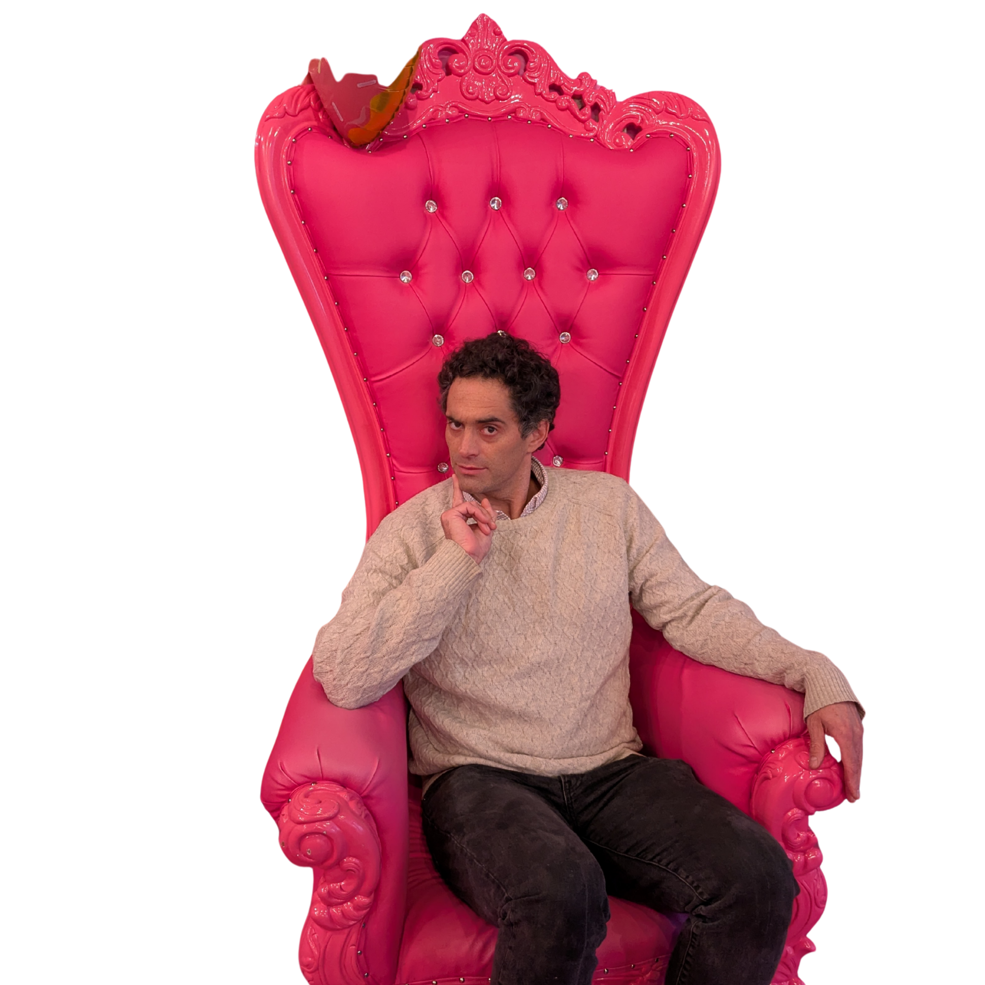 Andy in a pink armchair